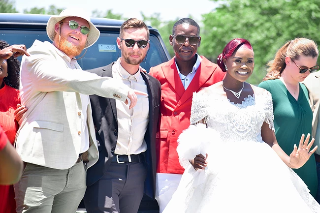 Wedding group photo with family and friends